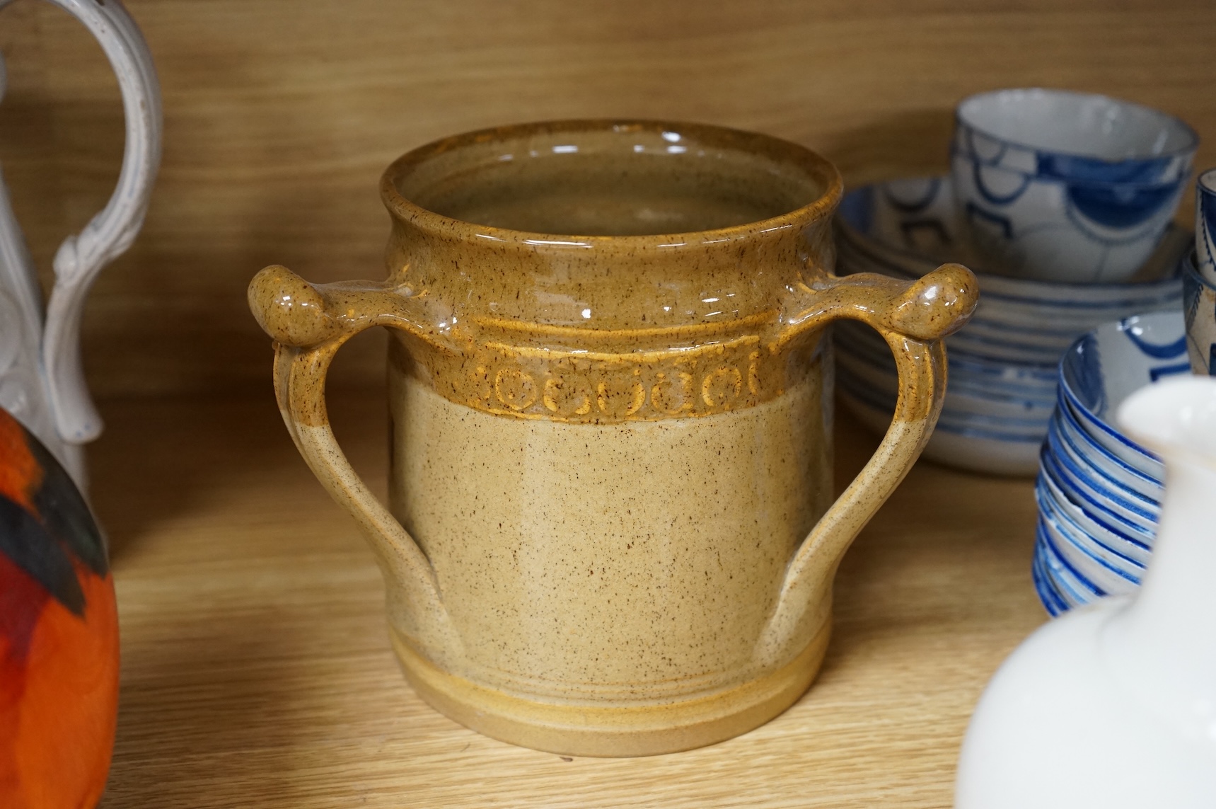 A collection of seven various ceramic vessels including Bretby, Poole, Worcester, continental art pottery etc. 26cm